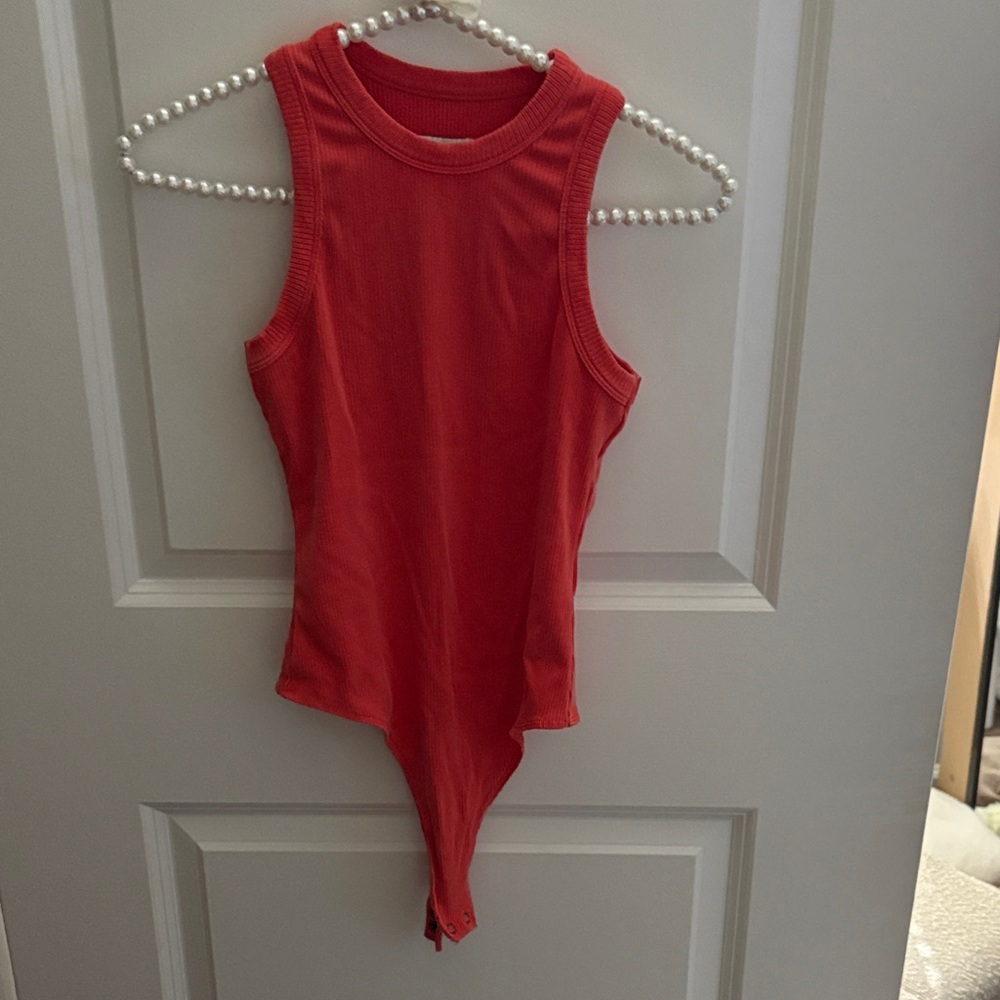 orange pistola body suit
